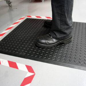 Man standing on black Diamond Lock Rubber Workplace Mat