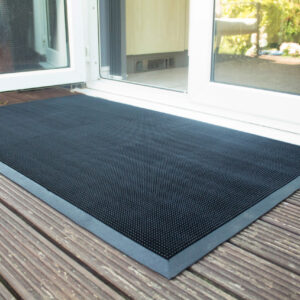 Black doormat outside bifolding doors