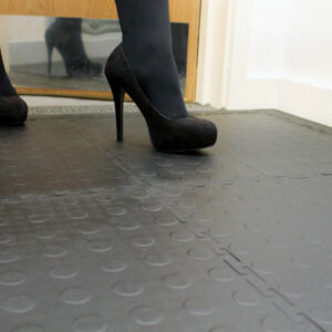 High heels walking on Interlocking tiles