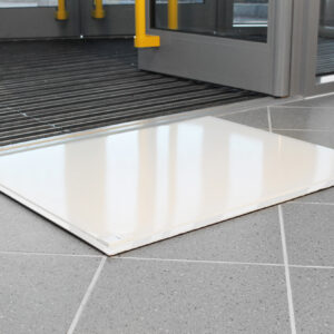 Sheeted Tack Cleaning Mat outside a building entrance